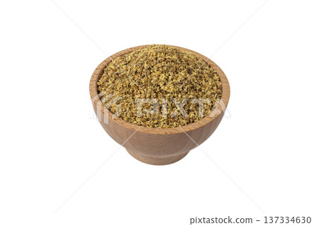 dried flowers of black lilac or black elder in latin sambuci flos in wooden bowl isolated on white background.Herbs. Alternative medicine. 137334630