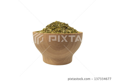 passion flower herb in latin - passiflora incarnata in wooden bowl isolated on white background. 137334677