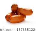 Appetizing sausages close-up on a white isolated background 137335122