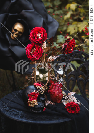Gothic Halloween Table Setting with Skulls and Red Roses Gothic Halloween Table Setting with Skulls and Red Roses 137336063