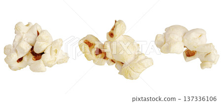 Delicious white popcorn kernels isolated on white. Concept of movie watching, leisure and fun. 137336106