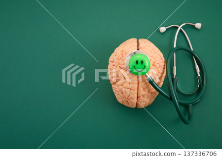 Brain model with stethoscope checking mental health and wellness 137336706