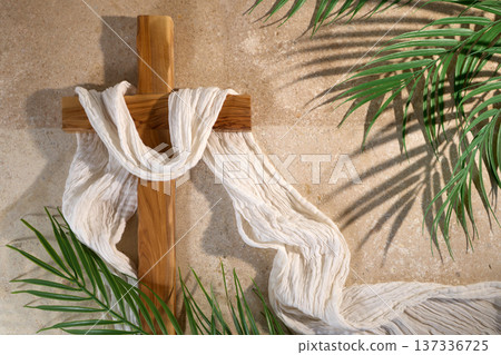 Wooden cross draped white cloth with palm fronds Wooden cross draped white cloth with palm fronds 137336725