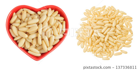 Shelled European pine nuts in ceramic bowl isolated on white background with full depth of field. Top view. Flat lay Shelled European pine nuts in ceramic bowl isolated on white background with full depth of field. Top view. Flat lay 137336811