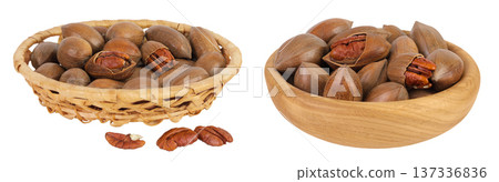 pecan nut in a wicker basket isolated on white background with full depth of field pecan nut in a wicker basket isolated on white background with full depth of field 137336836