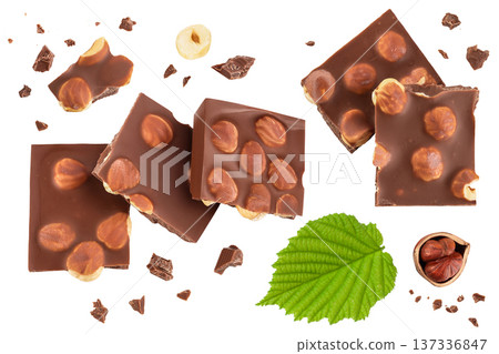 Chocolate with hazelnuts isolated on white background with full depth of field. Top view. Flat lay 137336847