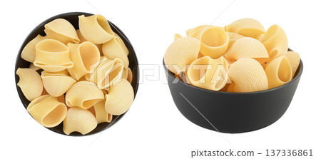 lumaconi pasta in ceramic bowl isolated on white background with full depth of field. Top view. Flat lay lumaconi pasta in ceramic bowl isolated on white background with full depth of field. Top view. Flat lay 137336861