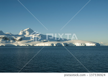 Lemaire strait coastal landscape, mountains and icebergs, 137336924