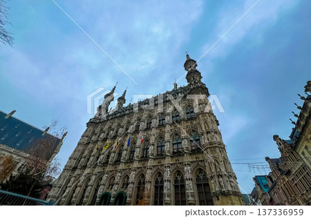 Gothic architecture of Leuven town hall with christmas preparations Gothic architecture of Leuven town hall with christmas preparations 137336959
