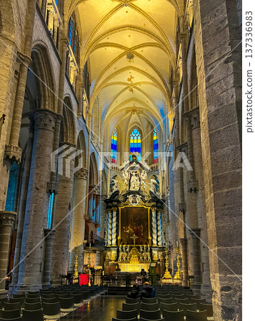 Church Interior Featuring Stained Glass Windows and Altar Surrounded by Columns Church Interior Featuring Stained Glass Windows and Altar Surrounded by Columns 137336983