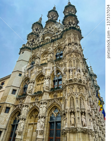 Gothic architecture of Leuven town hall with christmas preparations Gothic architecture of Leuven town hall with christmas preparations 137337034