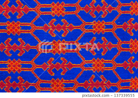 Bright blue Uzbek carpet with red-orange motifs 137339555