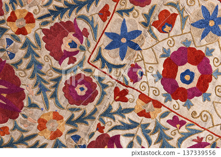 Intricate colorful wall embroidery on a traditional textile Intricate colorful wall embroidery on a traditional textile 137339556