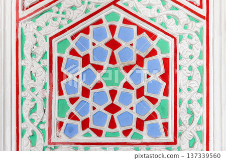 Ganch carved geometric and floral relief pattern 137339560