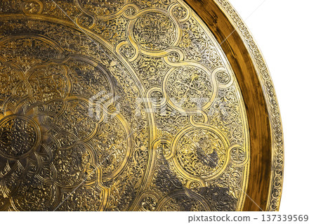 Uzbek brass tray featuring Middle Eastern arabesque 137339569