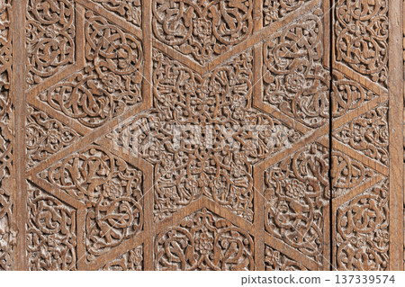 Wooden panel featuring an Islamic geometric star pattern 137339574