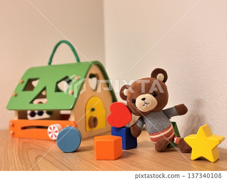 Building blocks and teddy bear Building blocks and teddy bear 137340108