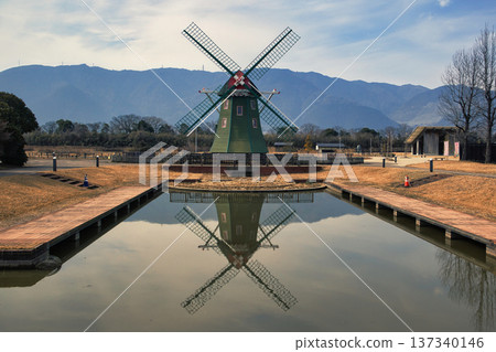 Windmills shining against the blue winter sky Windmills shining against the blue winter sky 137340146