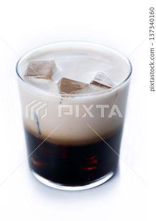 Refreshing Boozy White Russian Cocktail with Vodka and Cream 137340160