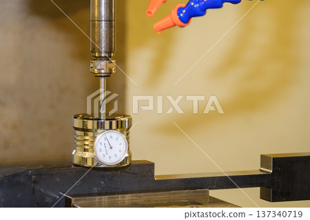 Manual tool length compensation setup for a CNC drill bit using a high-precision dial gauge tool presetter. Manual tool length compensation setup for a CNC drill bit using a high-precision dial gauge tool presetter. 137340719