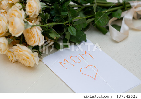 Childrens handmade greeting card for Mothers Day with a fresh yellow rose bouquet, Childrens handmade greeting card for Mothers Day with a fresh yellow rose bouquet, 137342522