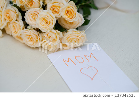 Childrens handmade greeting card for Mothers Day with a fresh yellow rose bouquet, Childrens handmade greeting card for Mothers Day with a fresh yellow rose bouquet, 137342523
