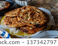 Delicious Fried Flatbreads Served on a Plate 137342797