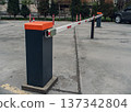 Parking Barrier Gate in a Modern Lot 137342804
