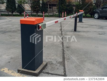 Parking Barrier Gate in a Modern Lot Parking Barrier Gate in a Modern Lot 137342804