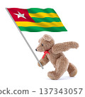 Togo flag being carried by a cute teddy bear 137343057