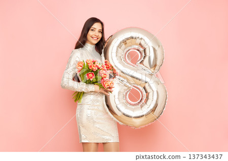 Woman hold bouquet of flowers and balloon number 8 137343437