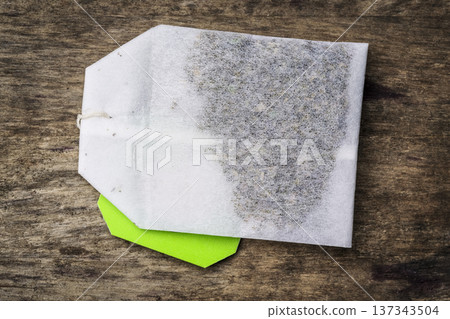 Tea Bag on Wooden Background 137343504