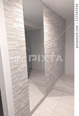 A stylish entrance hall with Ecocarat walls and a full-length mirror A stylish entrance hall with Ecocarat walls and a full-length mirror 137343548