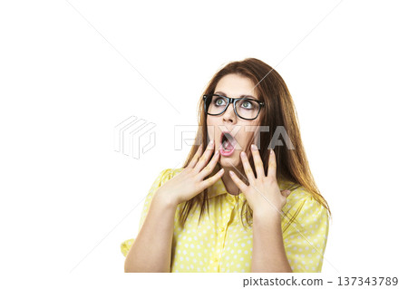 Shocked amazed woman gesturing with hands 137343789
