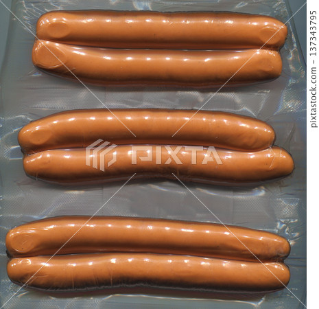 vacuum-packed sausages vacuum-packed sausages 137343795