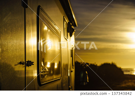 Camper car on nature at sunrise 137343842