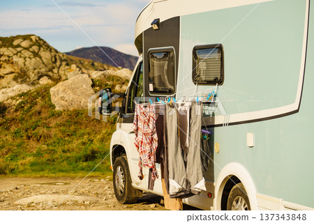 Washing laundry hanging to dry outdoors at caravan 137343848