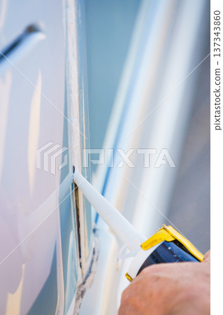 Applying silicon on caravan body Applying silicon on caravan body 137343860