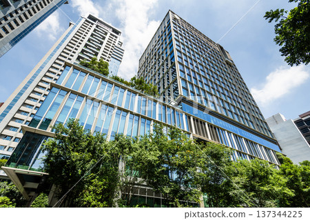 Low-angle view of the InterContinental, located beside the Calligraphy greenway of Taichung in Taiwan. Low-angle view of the InterContinental, located beside the Calligraphy greenway of Taichung in Taiwan. 137344225