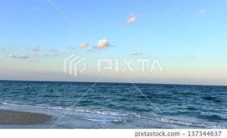 Vast Blue Seascape. Wide Ocean With Distant Horizon And Shimmering Surface. Breathtaking Panoramic Turquoise Sea With Refreshing Coastal Breeze And Sparkling Surface 137344637