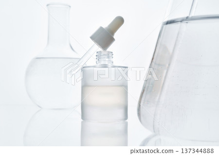 Skincare cosmetic dropper bottle laboratory science background Skincare cosmetic dropper bottle laboratory science background 137344888