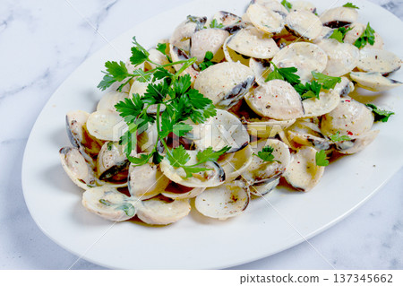 vongole clams, in cream sauce, on a white plate, homemade, top view, no people, vongole clams, in cream sauce, on a white plate, homemade, top view, no people, 137345662