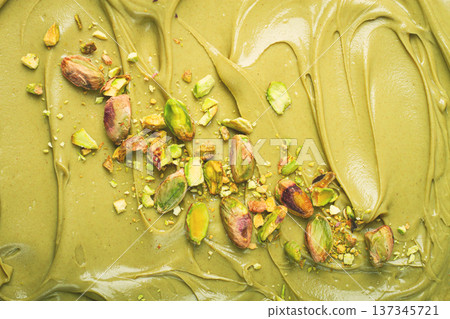the texture of pistachio paste, with pistachios and crumbs, full frame, close-up, 137345721