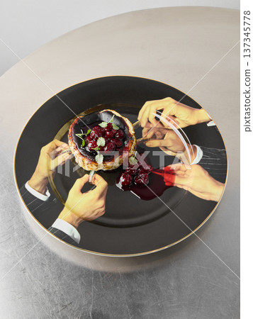 Communal gathering around vibrant berry pie on dark plate 137345778