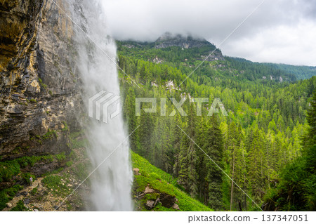 Immerse yourself in the beauty of Johannes Waterfall located near Obertauern, Austria. Surrounded by lush greenery and dramatic mountain landscapes, this natural wonder captivates visitors. Immerse yourself in the beauty of Johannes Waterfall located near Obertauern, Austria. Surrounded by lush greenery and dramatic mountain landscapes, this natural wonder captivates visitors. 137347051