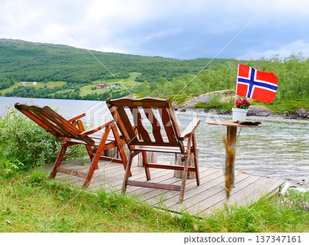 Rest stop area on norwegian fjord shore 137347161