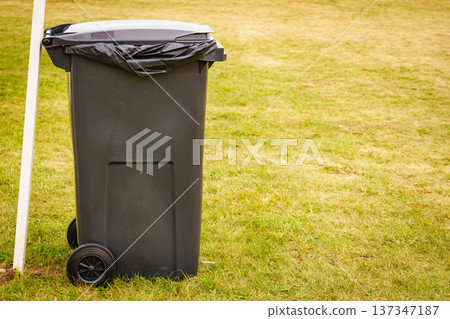 Recycle bin with plastic trash bag outdoor 137347187