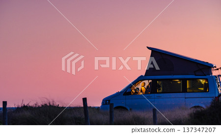 Camper van with roof top tent camp on beach Camper van with roof top tent camp on beach 137347207