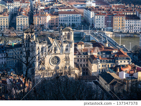 Lyon, france. December 27,2023. Aerial view capturing lyon, france, featuring the historic saint jean cathedral, saone river, and old buildings in vieux lyon Lyon, france. December 27,2023. Aerial view capturing lyon, france, featuring the historic saint jean cathedral, saone river, and old buildings in vieux lyon 137347378