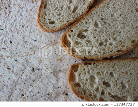 Gluten free nutrition and bread alternative. Yeast-free bread on a dietary flatbread with flax and sesame seeds Gluten free nutrition and bread alternative. Yeast-free bread on a dietary flatbread with flax and sesame seeds 137347727